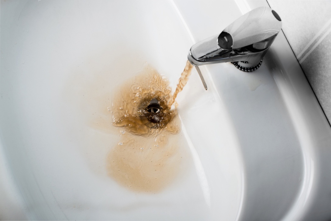 Discoloured water coming out of tap in home with hot water heater problems