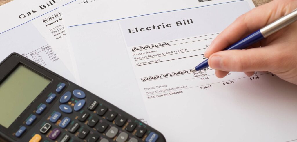 Person examining electric bill
