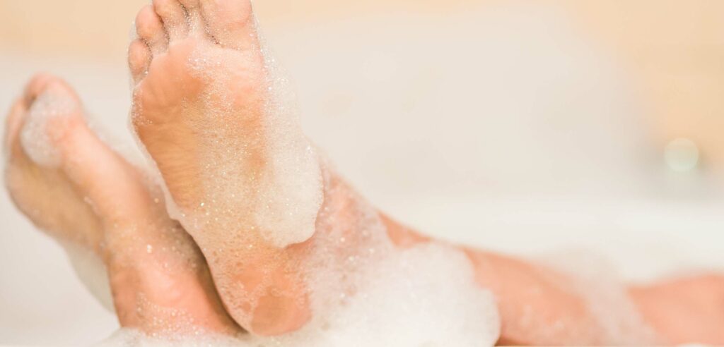 Feet in a bubble bath