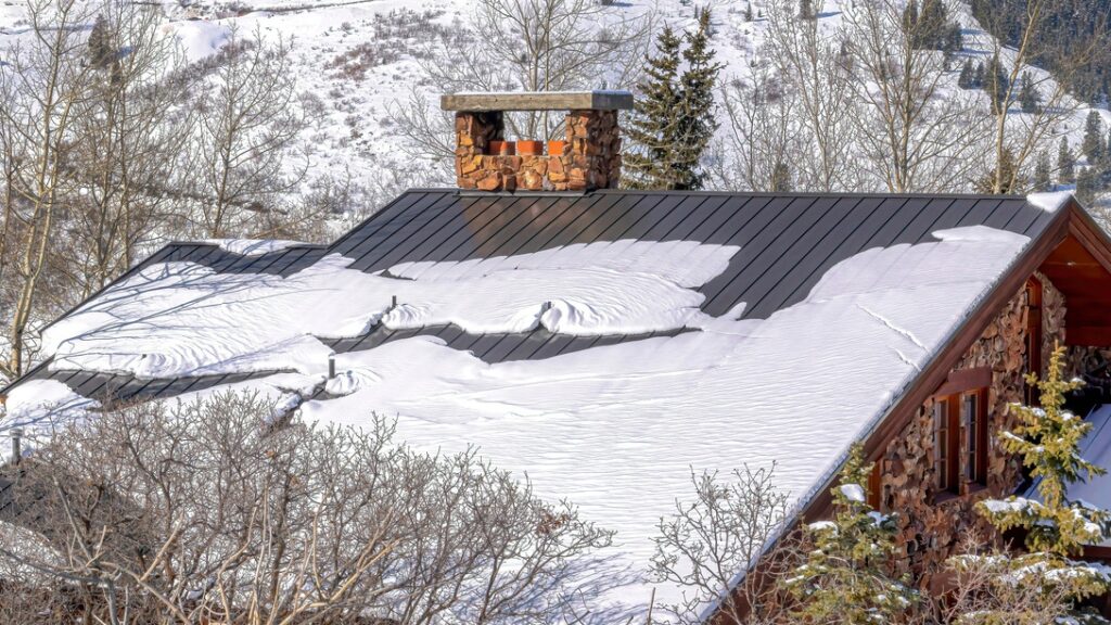 Home in winter with chimney visible