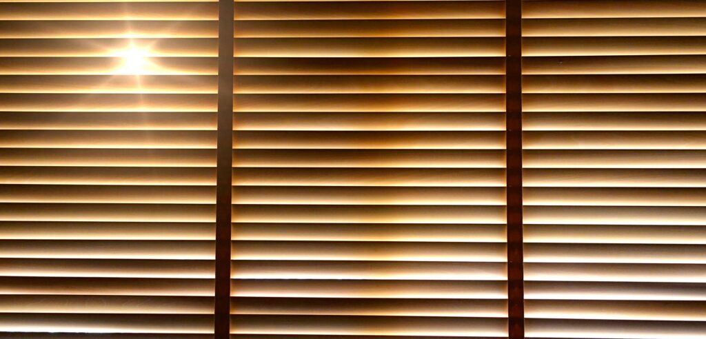 Sun shining through blinds