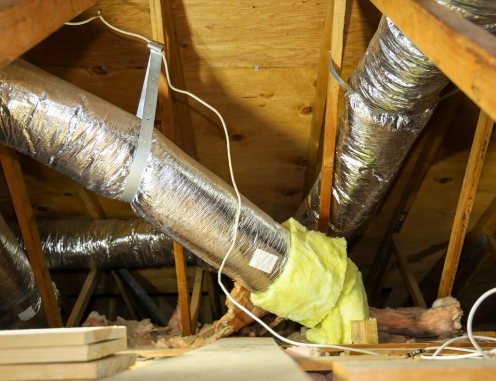 Sheet of fibreglass insulation wrapped around ductwork