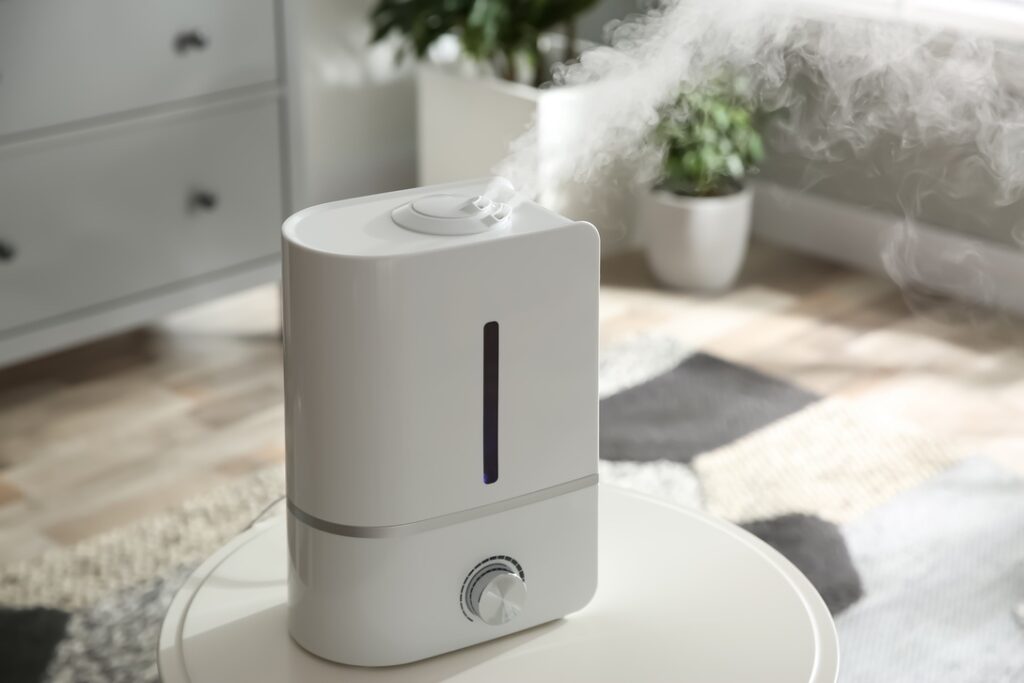 Standalone humidifier adding moisture to air in single room