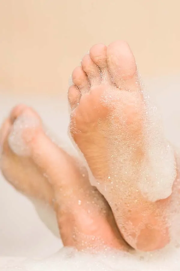 Feet in bubble bath
