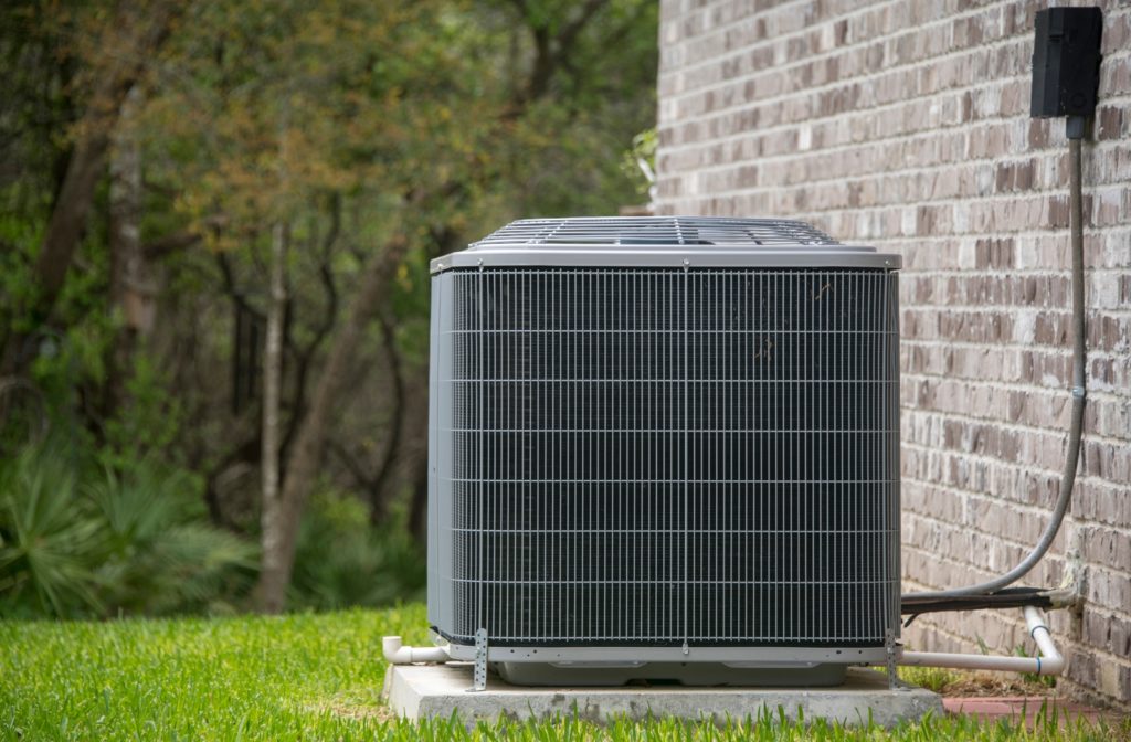 Alberta’s Ultimate Guide to Central Air Conditioners AC unit outside home