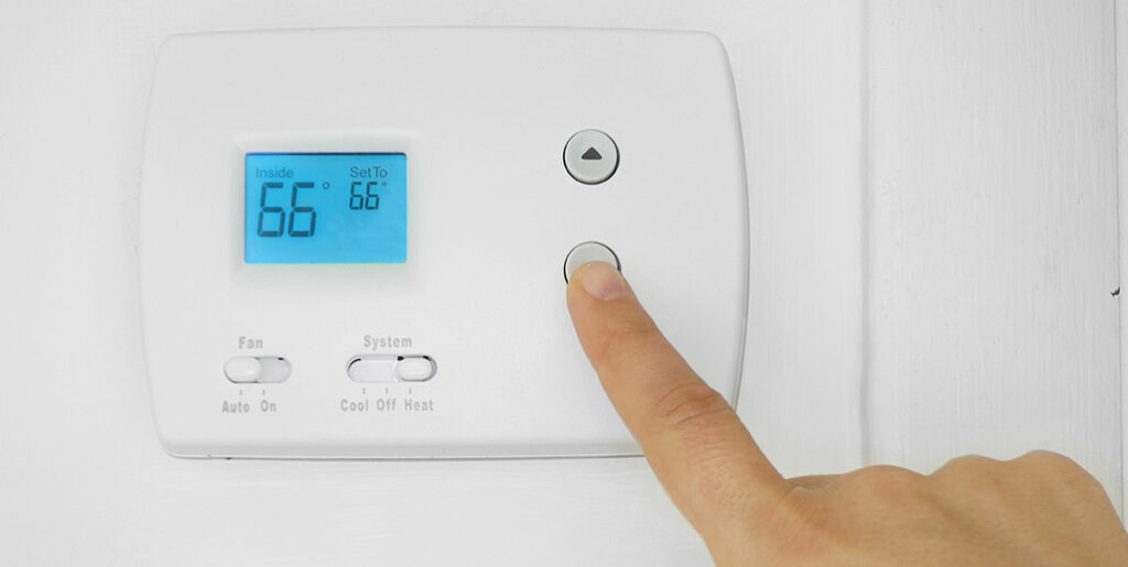 Ways to Make Your Air Conditioner Last Longer Hand setting thermostat to 66 degrees F.