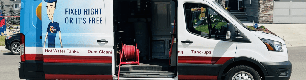 The Action Furnace duct cleaning van sits outside. The door is open, showing the vacuum hose.